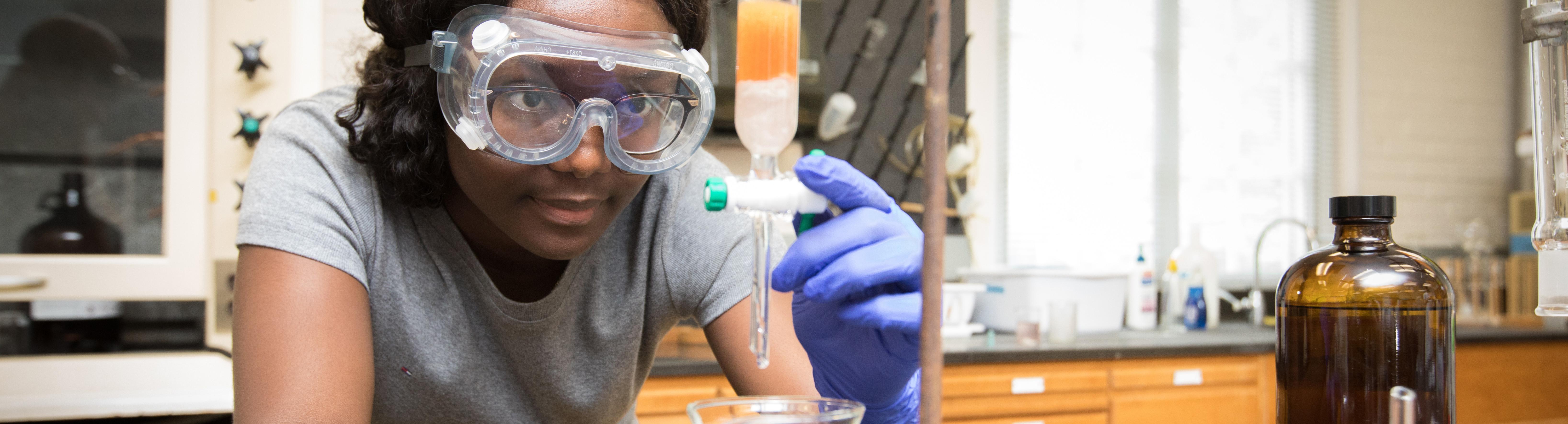 Student doing science experiment