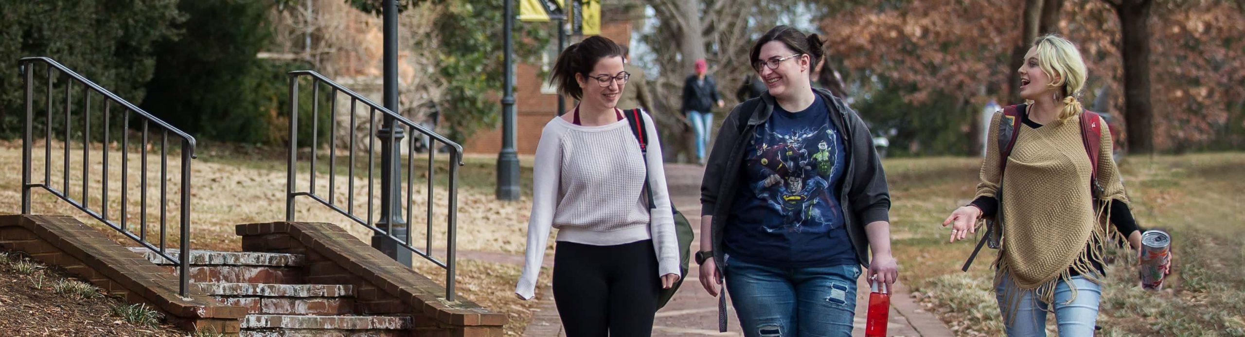 Photo of students walking through campus