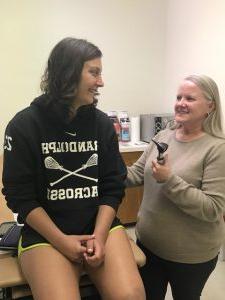 a student gets a check up in the health center