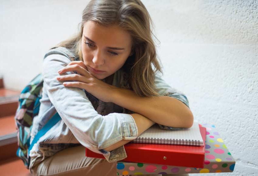 Depressed student. Photo credit: bestcolleges.com