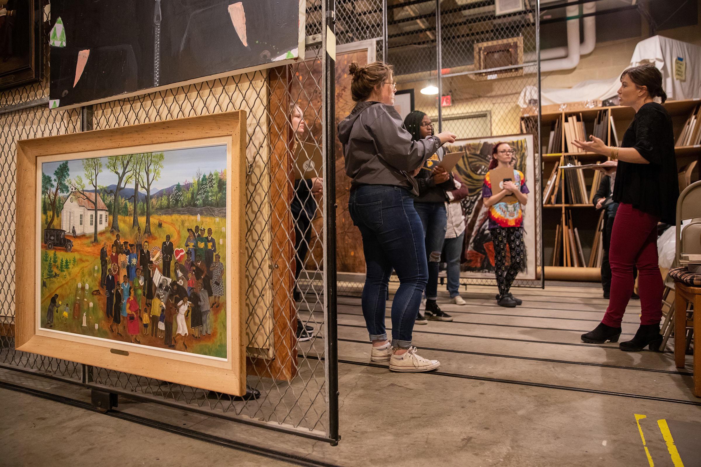 Students in the art vault at the Maier Museum of Art at Randolph College.