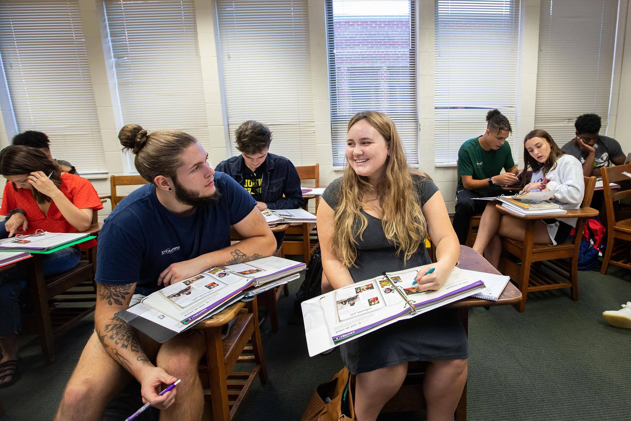 Students work on dialogue in Spanish class.